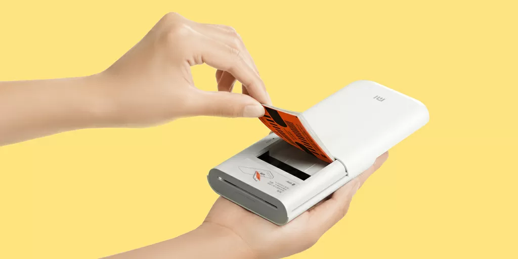 Портативный фотопринтер Xiaomi Mi Portable Photo Printer (XMKDDYJ01HT) – легкая и удобная загрузка бумаги